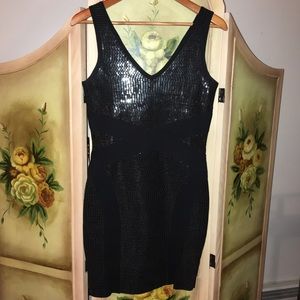 Black shiny body con dress
